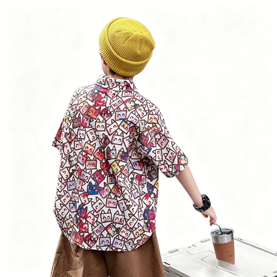 Boys' short-sleeved shirt with an all-over floral print