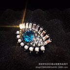 Diamond-encrusted alloy evil eye brooch accessory