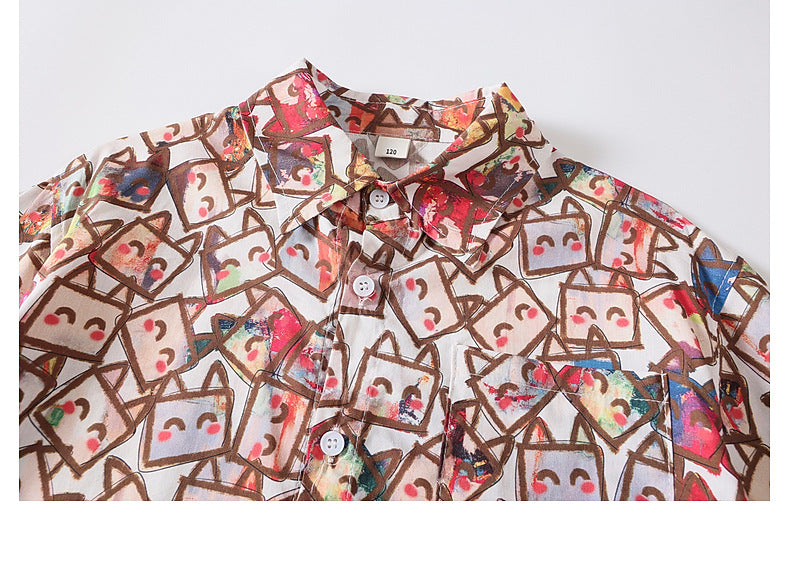 Boys' short-sleeved shirt with an all-over floral print