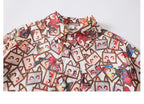 Boys' short-sleeved shirt with an all-over floral print