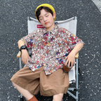 Boys' short-sleeved shirt with an all-over floral print