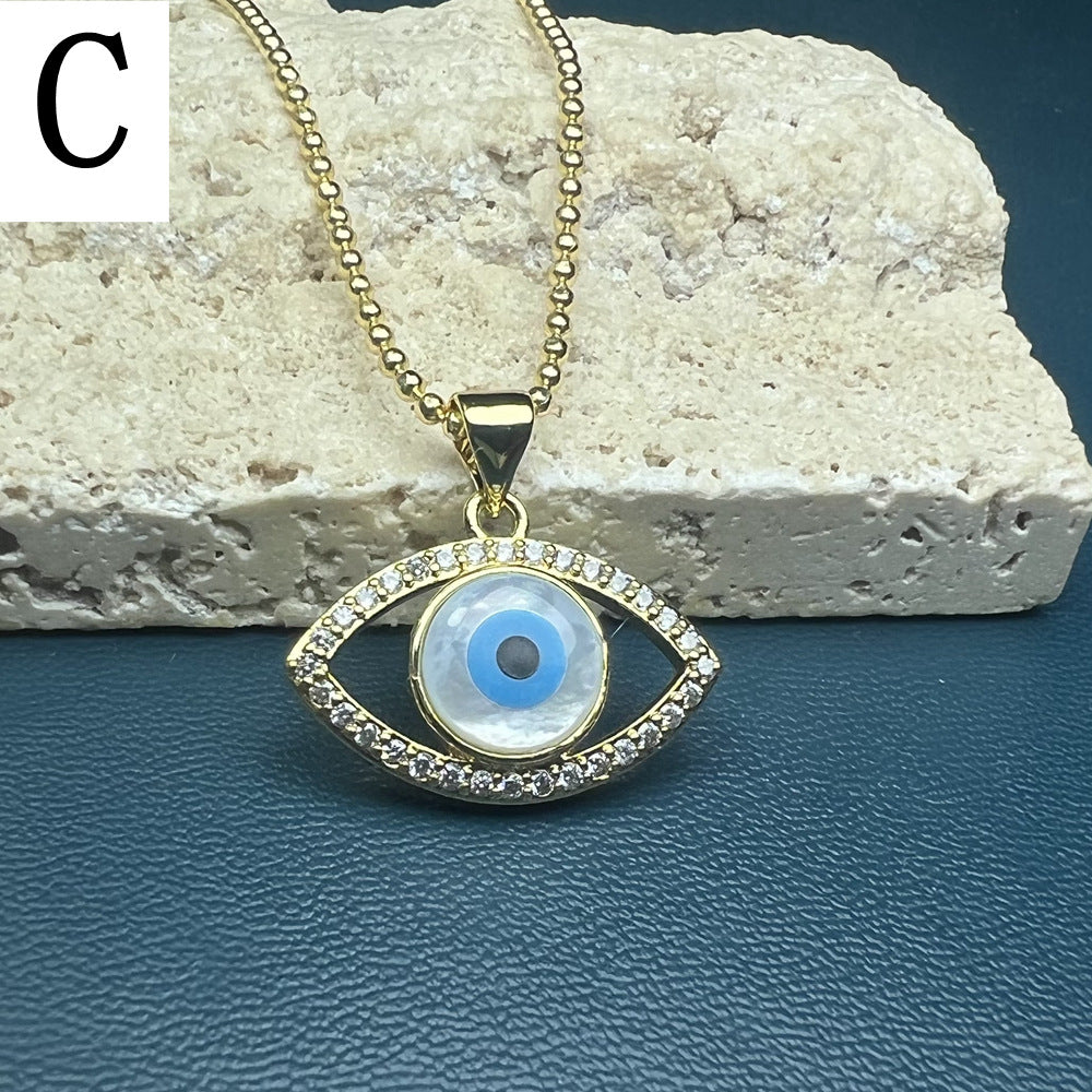 Famati's Hand Butterfly Shell Evil Eye Necklace