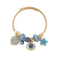 DIY Beaded Evil Eye Bracelet with Blue Rhinestones, Hearts, and Flowers