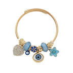 DIY Beaded Evil Eye Bracelet with Blue Rhinestones, Hearts, and Flowers