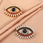 Diamond-encrusted Evil Eye Brooch