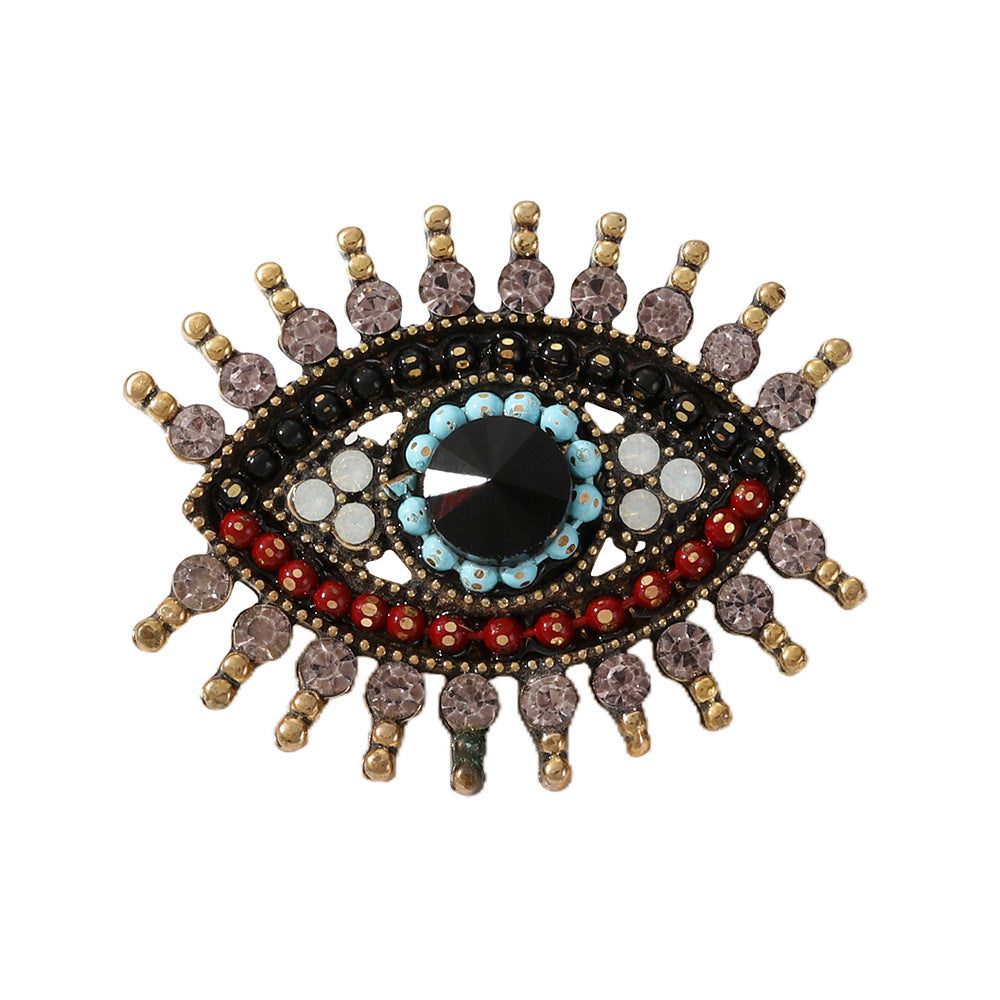 Long-lashed Devil's Eye Brooch