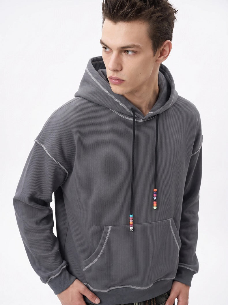 Color-block waffle-knit hoodie with beaded drawstring
