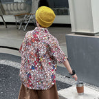 Boys' short-sleeved shirt with an all-over floral print