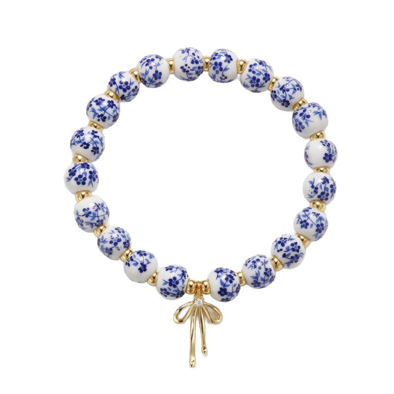 Nature Cast Metalworks Porcelain Bead Bracelet, Floral Beaded Bow Pendant Bracelet