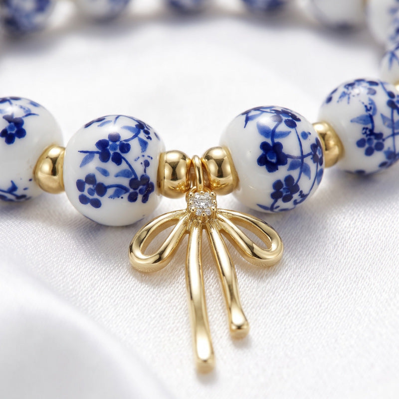 Nature Cast Metalworks Porcelain Bead Bracelet, Floral Beaded Bow Pendant Bracelet