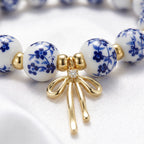 Nature Cast Metalworks Porcelain Bead Bracelet, Floral Beaded Bow Pendant Bracelet