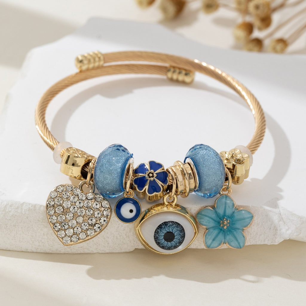 DIY Beaded Evil Eye Bracelet with Blue Rhinestones, Hearts, and Flowers