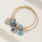 DIY Beaded Evil Eye Bracelet with Blue Rhinestones, Hearts, and Flowers